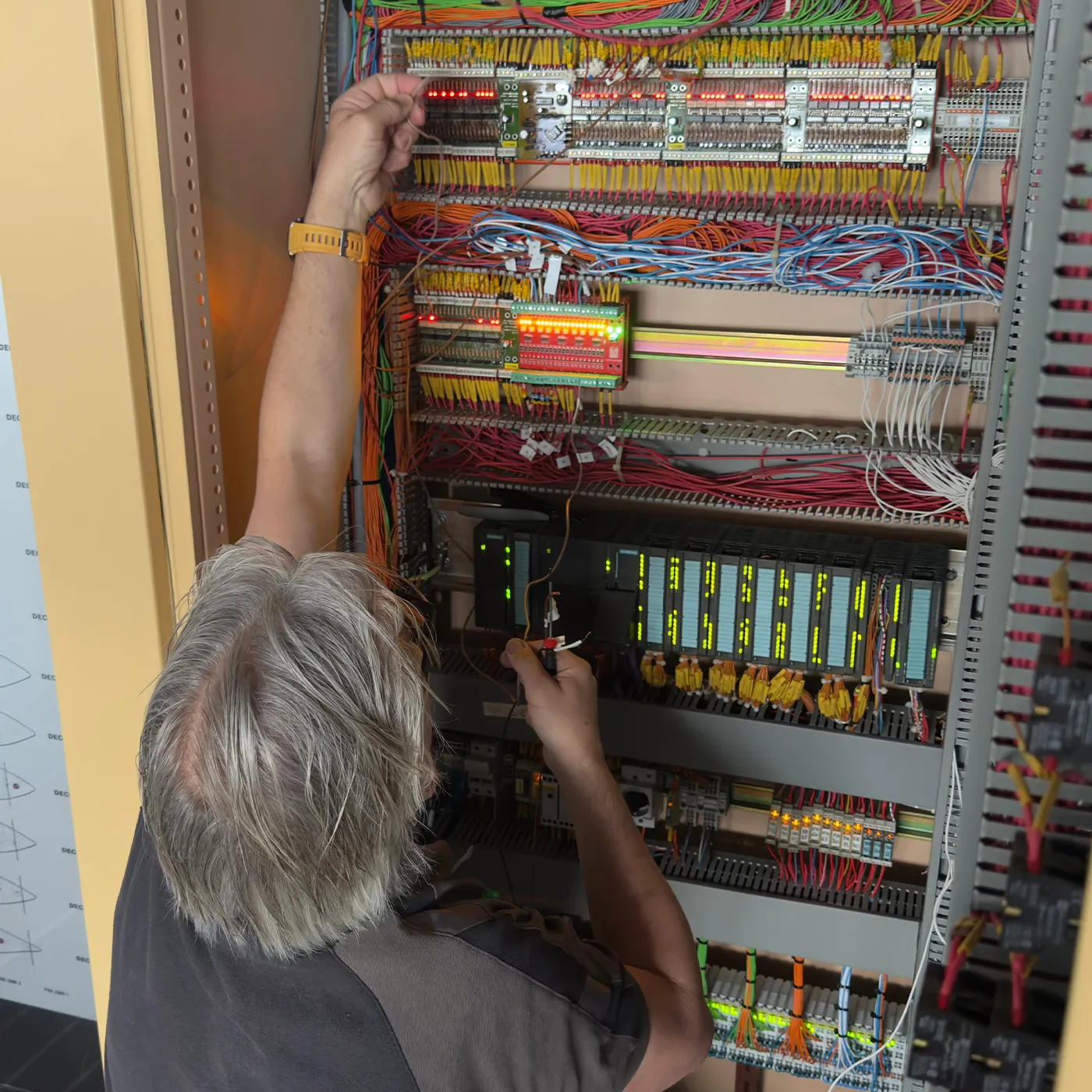 Ship operator working on vessel control systems